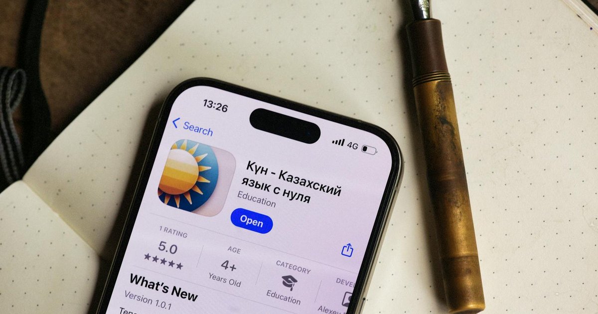 Smartphone with Spanish language learning app on screen