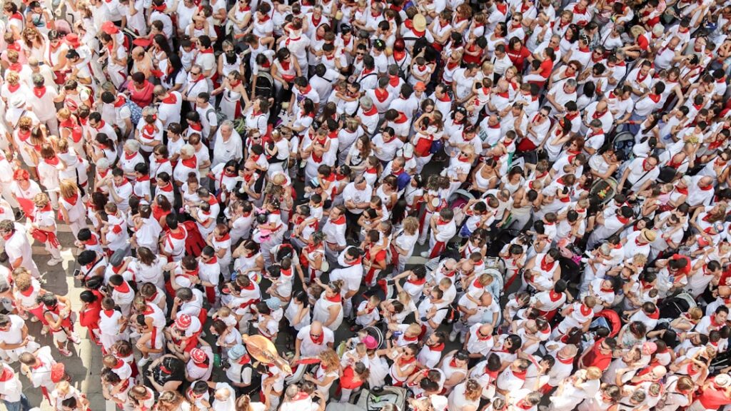 La Tomatina tomato fight festival in Buñol Spain with crowds throwing tomatoes