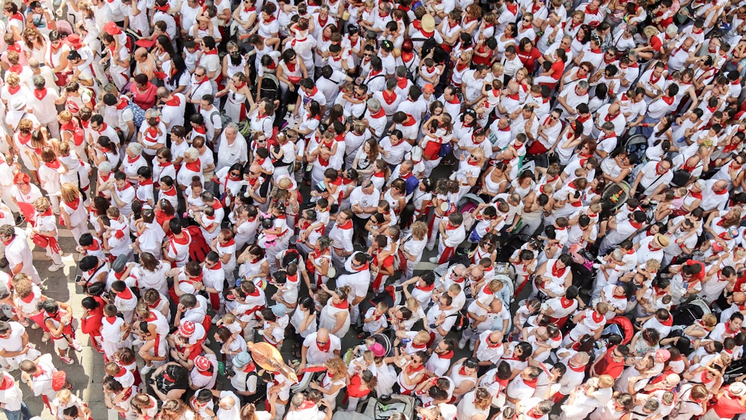 La Tomatina tomato fight festival in Buñol Spain with crowds throwing tomatoes