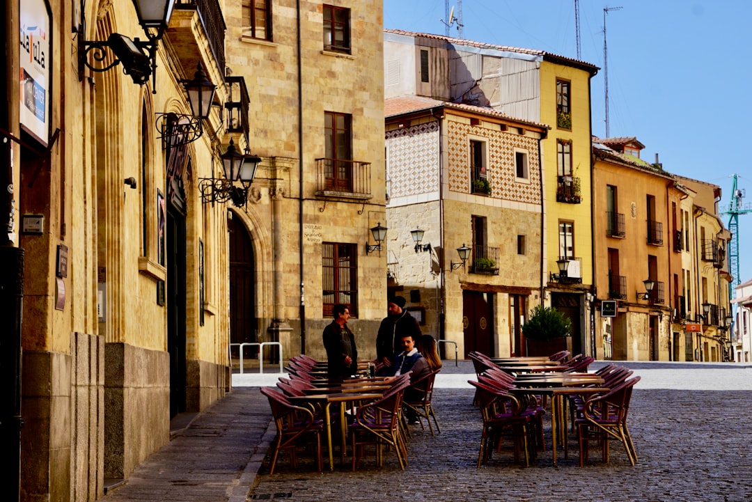 Salamanca old town in Spain, golden sandstone buildings at sunset
