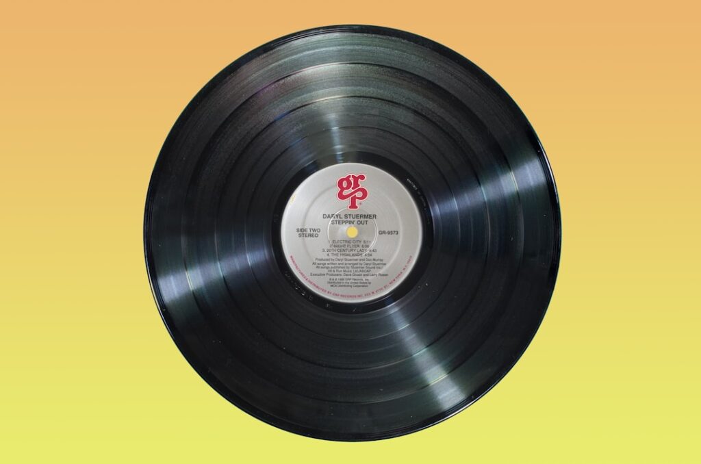 A stack of vinyl records, a visual for learning Spanish with songs and music