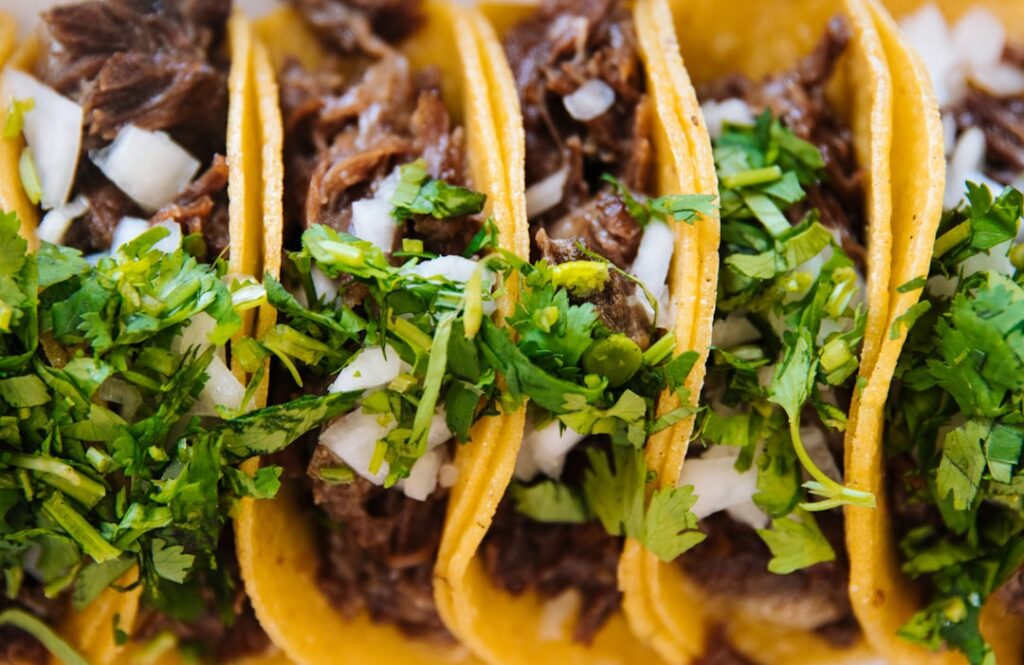 Mexican street food tacos on a taqueria counter