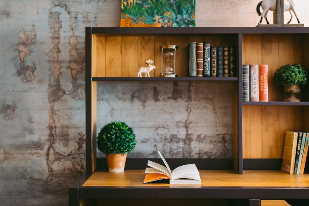An open book on a wooden desk