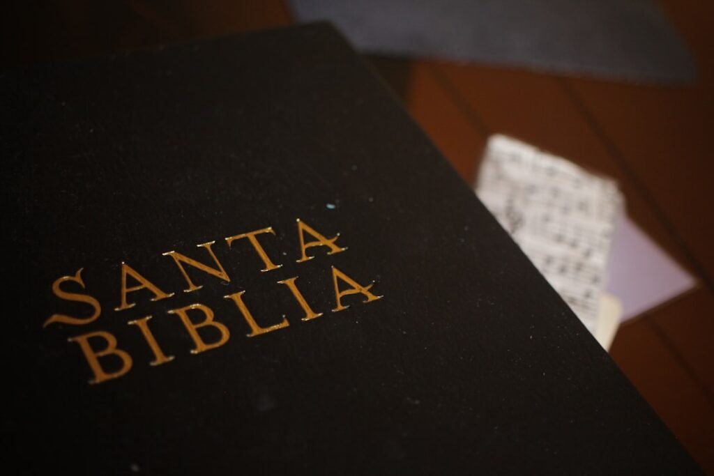 An open Spanish book on a table
